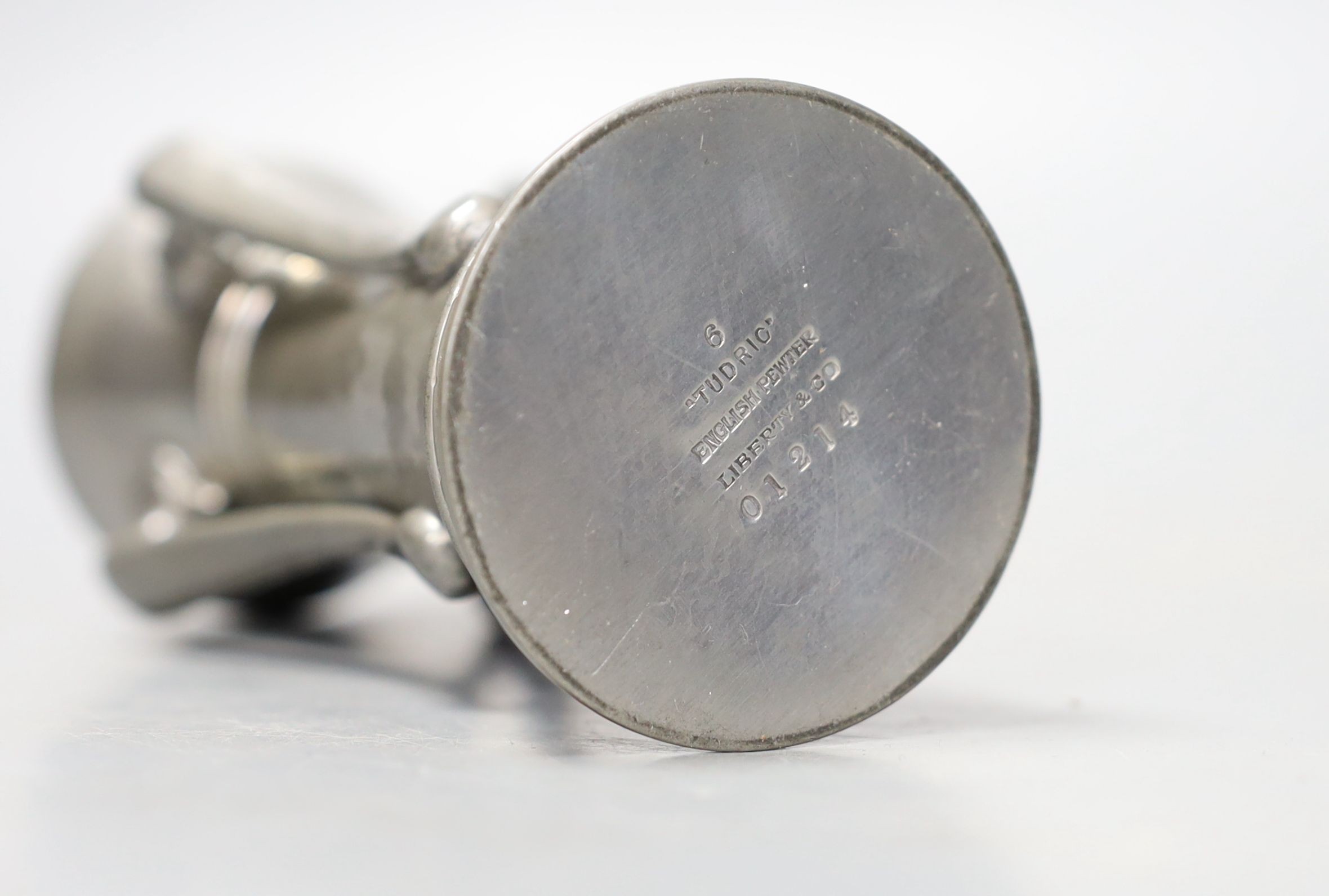 A Liberty’s Tudric pewter four-handled vase designed by Archibald Knox, shape 01214, 14cm. *This lot is being sold in aid of Prostate Cancer UK with 100% of the hammer price going to the charity”